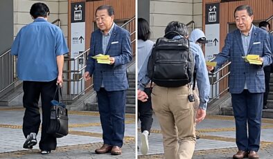 Japonya’nın eski başbakanı sokakta broşür dağıtırken görüntülendi